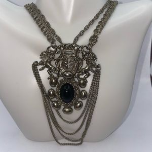 VNTG PAULINE RADER MIDIEVIL DESIGN WITH BLACK STONE. MEDALLION 26”